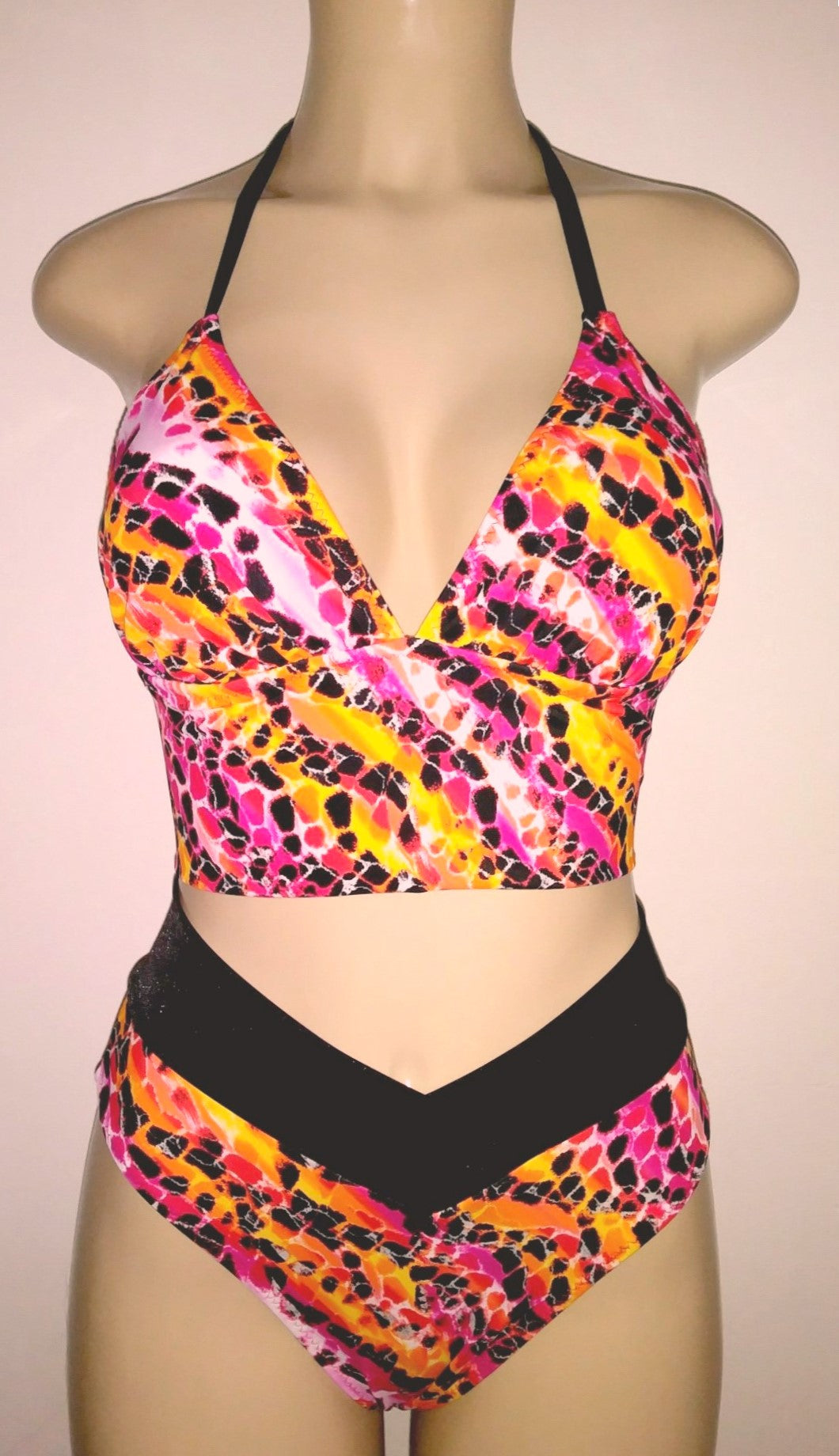 Short tankini top with crisscross bikini bottom